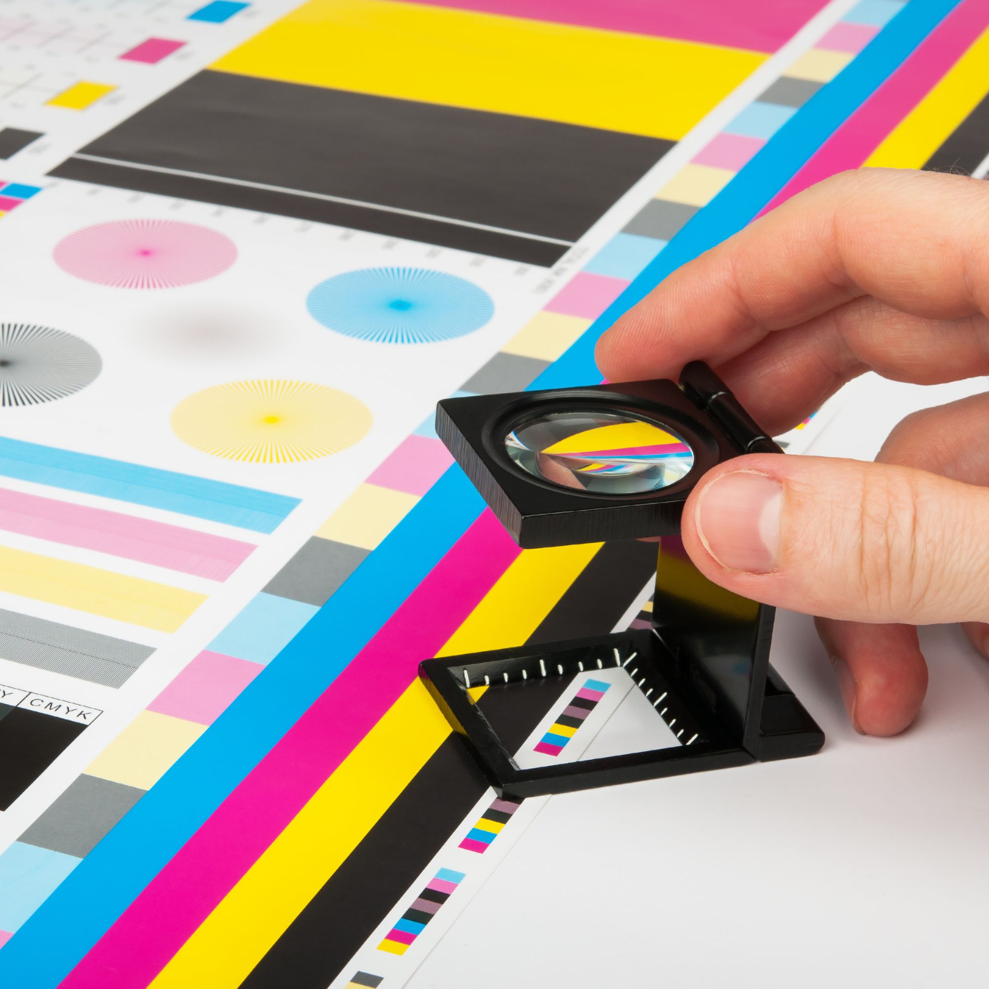Inspecting a color proof with a loupe